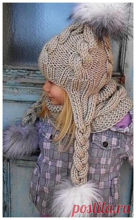 A HAT WITH PIGTAILS AND EARS