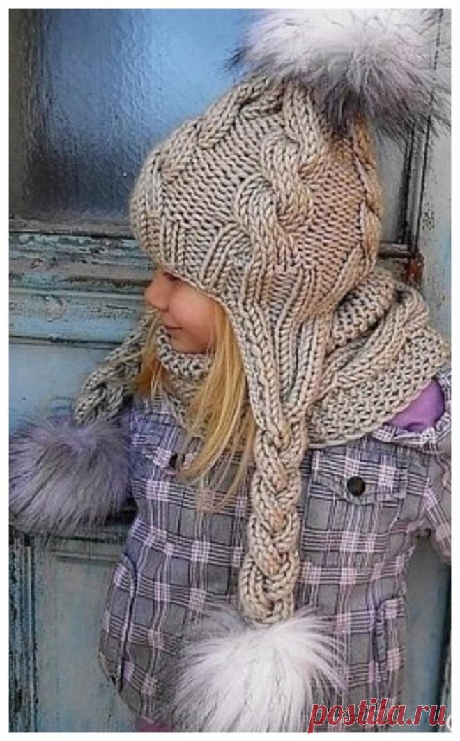 A HAT WITH PIGTAILS AND EARS