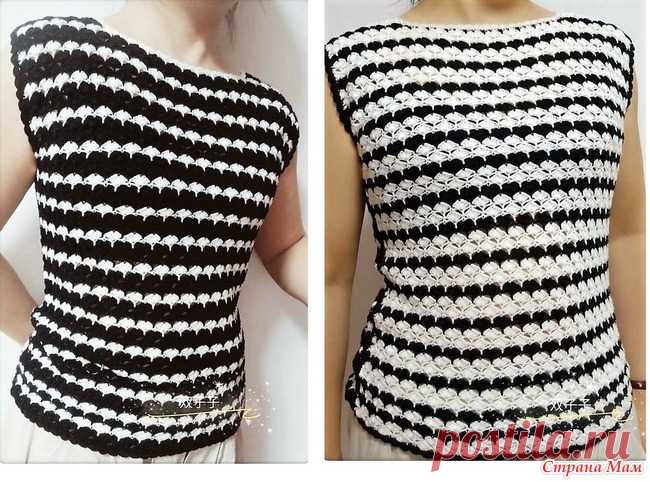 Черно-белый топ который можно носить задом на перед. Этот полосатый черно-белый топ оригинален тем что полоски на спинке и переде чередуются в разной последовательности.При желании его можно носить задом на перед.