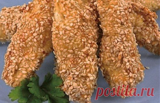 КОТктейль Вкусные куриные "пальчики"

Куриное филе - 500 гр.
Яйцо - 1 шт.
Панировочные сухари 0,5 стакана
Измельченный чеснок - 2 зубчика
Кунжут - 1-2 ст. ложки.

 приготовление:
Куриное филе промыть, осушить и нарезать полосками.
Яйцо взбить и поочерёдно окунуть в него каждую полоску из куриного филе, после чего обвалять его в специях, панировочных сухарях и кунжуте.
Запекать на разогретой сковороде в оливковом или другом растительном масле до золотистого цвет сторон