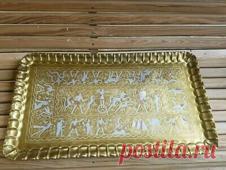 Vintage Large hand made ornate brass serving tray Egyptian Roman Horse Dog 27x15   cm
Состояние: Новый
В наличии у продавца
Все получил в целости, но как по мне все очень долго...
С момента получения заказа на складе в США и прихода в пункт выдачи в моем городе прошло полтора месяца.
При этом Boxbery, которой была передана моя посылка, доставила ее за две недели.