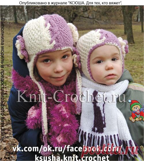 Вязанная спицами девичья шапочка.