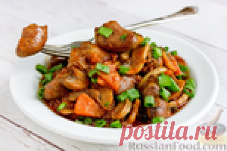 Куриные сердечки, тушенные с шампиньонами
