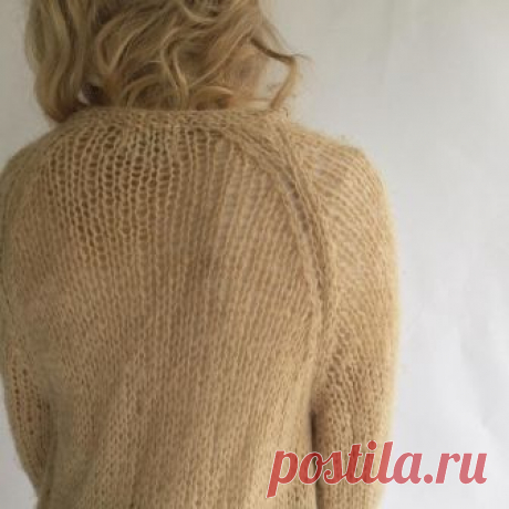 Open knit sweater designed specifically for shuffling around the house in slippers.
