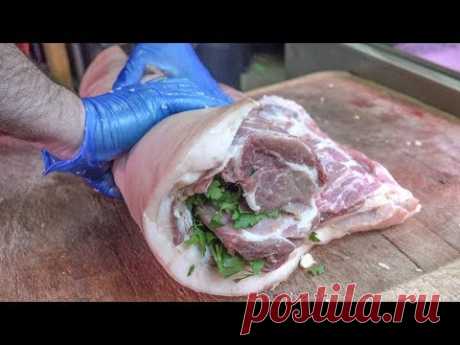 Stuffed Fat Pork Belly the Italian Way. Preparing "Porchetta". London Street Food
