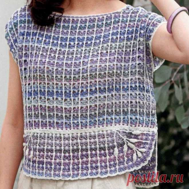 Красивый и оригинальный джемпер-безрукавка