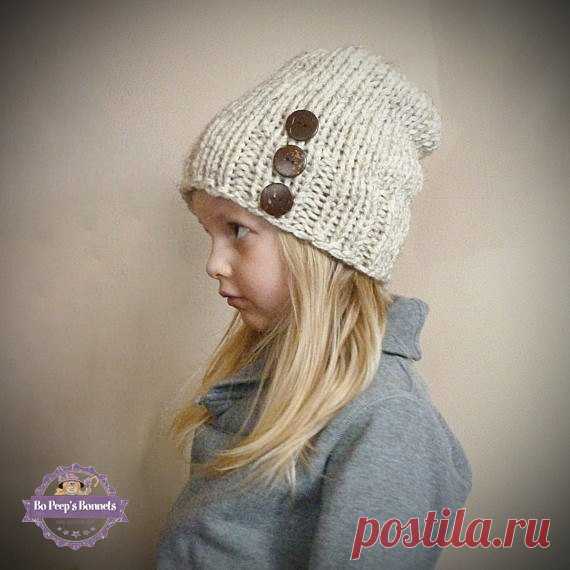 Toddler Slouch Hat in Wheat with Three Natural Coconut Buttons, Girls Slouchy Beanie, Slouch Beanie Boys Kids Children Toddler Knit Hat This hand knit slouchy beanie for kids is made of soft wheat yarn. The hat is knit with a great hipster slouch and has three natural coconut buttons hand sewn onto the hat. Please select a size from the drop down menu on the right when ordering:  Young Toddler: Head Circumference 18