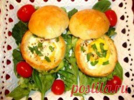 Булочки-вкусняшки. Рецепт тут:  https://topvkusa.ru/bulochki-zapechennyie/  
Эта идея не раз выручит вас, когда нужно быстро и просто приготовить закуску для неожиданных гостей или сделать завтрак, от которого не сможет отказаться даже самый привередливый ребенок. Используя эту идею, приготовьте неограниченное количество разнообразных вариантов.