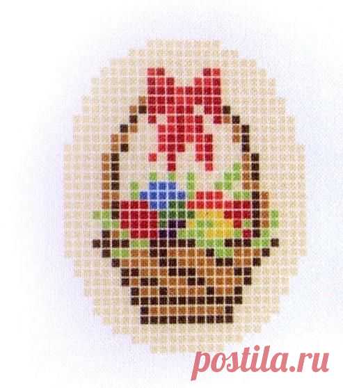 a cross - stitch picture of a basket with flowers in it on a white background