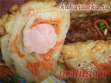 Сосиски в капустных листьях