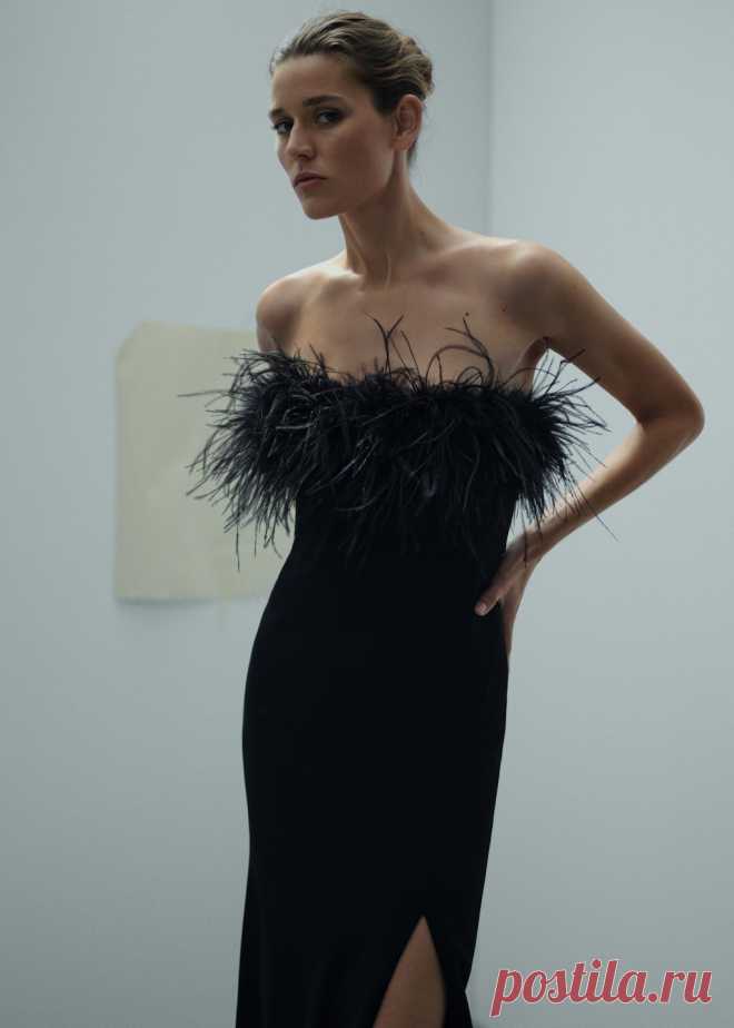 Strapless dress with feather detail - Women | MANGO OUTLET USA Elegant, sophisticated and flattering: this satin lingerie piece, with a feather-embellished strapless neckline and side slit detail, is the ideal choice for this season's events. Fluid fabric. Long design. Strapless. Feather detail. Sleeveless. Back zipper closure. Inner lining. Made in Morocco. Party and ceremony collection. Prom collection. Items from the CAPSULE collection can be exchanged or returned withi...