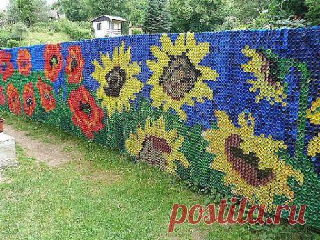забор из крышек...я обалдел.