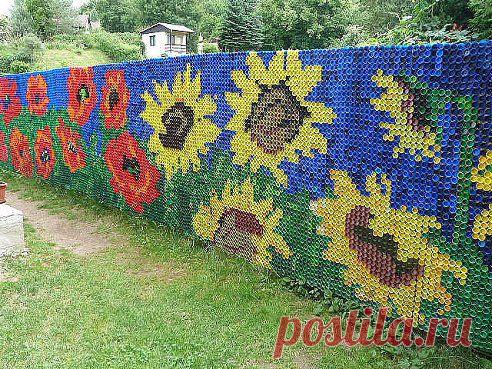 забор из крышек...я обалдел.