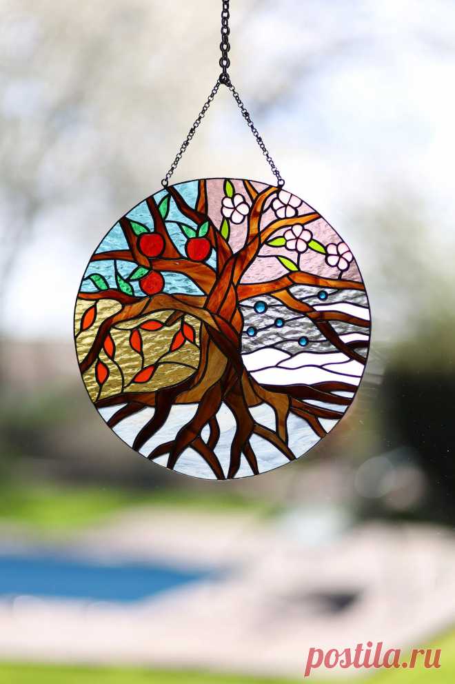 Stained glass suncatcher Four Seasons Tree of Life Stain glass panel P Four Seasons window hanging suncatcher made of stained glass pieces by my own disign.Handmade using Tiffany copper foil technique.Looks amazing in the sunlight.You will get it completely ready for installation. It comes with a self-adhesive hook and copper chain.It will be a great gift for friends or relatives.