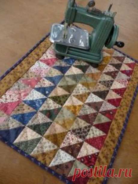 Fine small quilts like these are every bit as much art as a painting to hang on the wall. Beautiful, thank you...