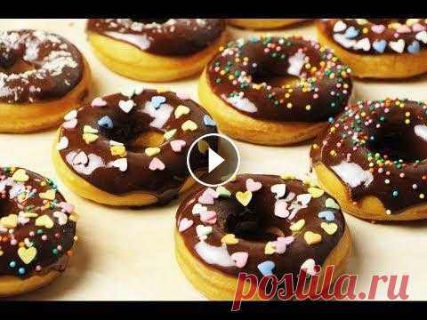 Пончики с Шоколадной Глазурью. Просто Объедение! Для теста: Теплое молоко - 160 мл Теплая вода - 100 мл Растопленное сливочное масло - 100 гр Соль - 1/2 ч.л Сахар - 80 гр Яйца - 1 шт Дрожжи - 2 ч.л М...