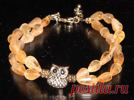 Браслет из янтаря с совой.