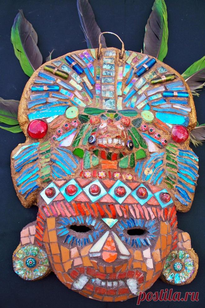 Aztec Mask #5 This clay mask hung in the woods forever and has been rejuvenated!  Stained glass, beads, millefiori, shell, iridescent vitreous tile,  green turquoise beads,  Van Gogh glass,  and marbles.