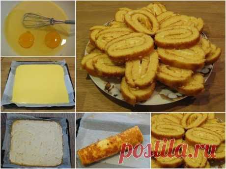 Вкусный рулет на сгущенке 
Легкое и очень быстрое в приготовлении лакомство к чаю. 
Ингредиенты: 
1 банка сгущенного молока,
2 куриных яйца,
250 г  муки,
половина чайной ложки соды гашеной лимонном соком,
щепотка соли.
Для начинки вареная сгущенка или творог с изюмом или курагой.
Приготовление: 
1. Взбить яйца со сгущенкой. Постепенно всыпать муку, соль и добавить соду гашеную соком лимона. 
2. Противень выстелить пергаментом или силиконовым ковриком. Если вы используете пергамент, то его необх