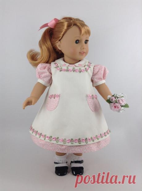 1950's American Girl 18-inch Doll Clothes - Pink Floral Dress, Pinafore, & Petticoat Handmade dress, pinafore, and petticoat for American Girl and other similar 18-inch dolls.  Maryellen is modeling a 1950s dress with tiny cream-colored flowers on pink. Features include a lined bodice trimmed with cream-colored crocheted lace over pink grosgrain ribbon, a cream-colored Peter Pan collar with pink button accent, puffed and banded sleeves, a gathered skirt with lace and ribbo...