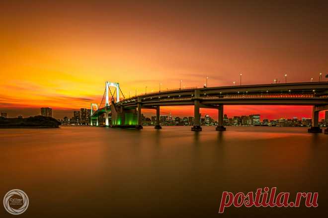 Golden Glow, Tokyo Rainbow Bridge Colors of evening glow caputerd with 3 minutes exposure, Tokyo Rainbow Bridge in lit and the cityscape of Tokyo Bay area. Taken in 
