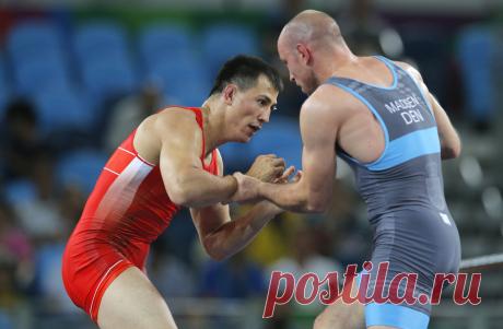 РИО-ДЕ-ЖАНЕЙРО, 15 августа. /ТАСС/. Российский борец греко-римского стиля Роман Власов стал чемпионом Олимпийских игр 2016 года в весовой категории до 75 кг. Подробнее на ТАСС: https://tass.ru/sport/3537858 | ТАСС: Спорт - Борец греко-римского стиля Роман Власов завоевал золото ОИ