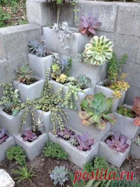 It’s a simple proposition.  Arrange the blocks however you like them.  Then, add dirt and plants. It’s kind of a fool-proof system! Here are some ideas to get you inspired: 1.  Here is an example where they had an existing cinderblock wall (which is not a pretty situation to have in your yard) and they …