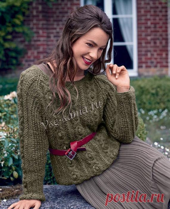 Короткий пуловер с косами