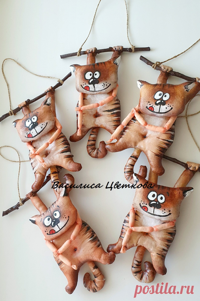 Кот с сосисками