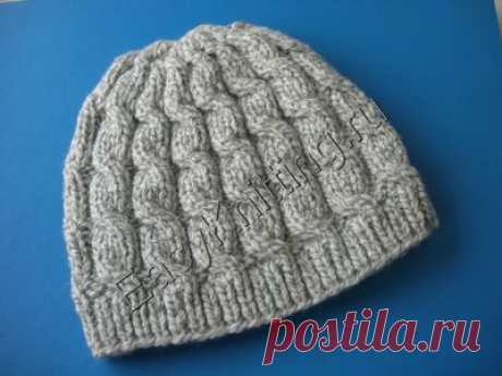 Женская шапка связанная аранами
