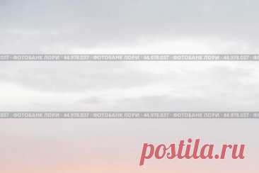 Pink gray clouds, sunrise sky cloudscape natural background Стоковое фото, фотограф Ilaronsia / Фотобанк Лори