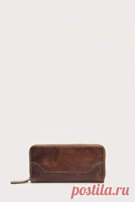 Melissa Zip Wallet A modern classic you'll never want to leave home without. Handcrafted from beautiful antique pull-up Italian leather, this continental wallet gets noticed for its well-loved, worn-in look. Designed to organize your cash, cards and a few extras, stash it in your bag or grab it and go when you're in the mood to keep things light. - Italian leather - 4" height - 10 interior pockets - Zipper closure