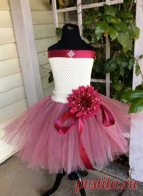 Flower girl floral and pearl decoration photo prop wedding burgundy ivory girls toddler birthday cake smash tutu dress This listing is for a handmade custom flower girl tutu tulle dress. Can be used for a wedding, photo shoot, or any special event. Can come in different colors to match the theme you want. Flower and ribbon will match. Tulle measurements are for knee length. Flower may vary slightly due