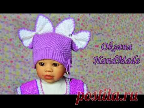 Шапка крючком с ввязанными бантиками. Crochet hat