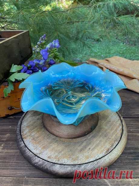 ANTIQUE Jefferson Glass Blue Opalescent Pedestal Bowl on Mercari Absolutely gorgeous  Early American Pressesed Glass Jefferson Blue Opalescent Beaded Fan, square Footed,  Ruffled bowl in Excellent condition! This bowl is made in aqua blue opalescent glass. The pattern is Beaded Fan, and was produced circa 1905. The bowl is 3 1/2" tall, and measures 8 1/2" diameter. The square pedastal bottom is 2 3/4" square with impressed textured dots. It is in excellent condition with n...