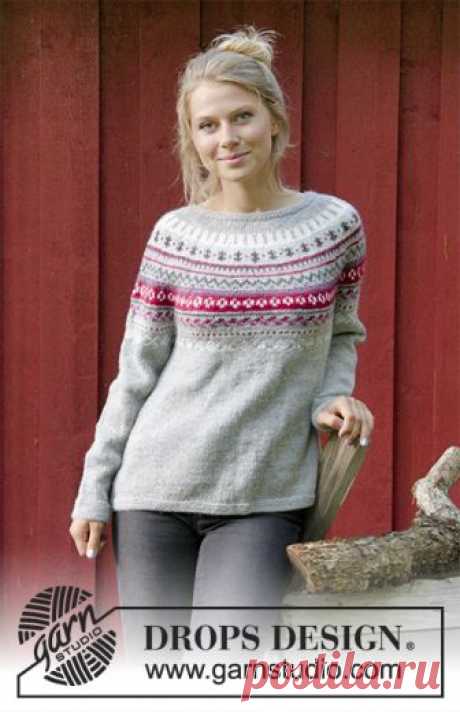 Winter Berries / DROPS 181-16 - Free knitting patterns by DROPS Design The set consists of: Knitted jumper with round yoke, multi-coloured Norwegian pattern and A-shape, worked top down. Sizes S - XXXL. Wrist warmers with multi-coloured Norwegian pattern.
The set is worked in DROPS Karisma.