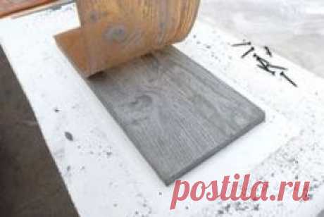 Make rubber mold with wood grain, then cast concrete. (I'll never do it, but it looks so cool!)