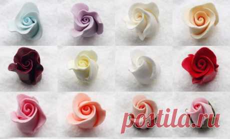 20 Gumpaste Roses Buds Flower Blossoms Sugar Fondant Cake Cupcake Topper Rosebud Rose buds handmade from Gum Paste  You will receive 20 Gum paste Rose Buds.  Red Pink White Light Blue Peach Yellow Ivory Burgundy Lavender   Measurement: Rose buds with leaves 1 inch long x ½ inch wide Rose buds without leaves 1 inch long x ¾ inch wide  Beautifully Detailed  Gum Paste Flowers are realistic and last years stored in a cool dry place such as a pantry or kitchen cabinet not used ...