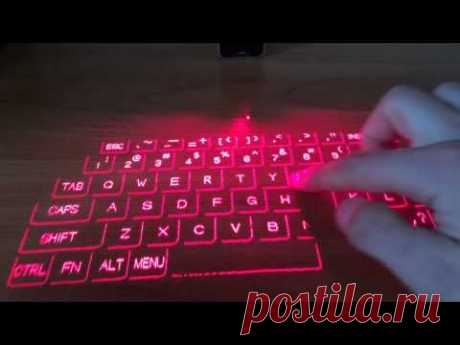 Портативная лазерная клавиатура.