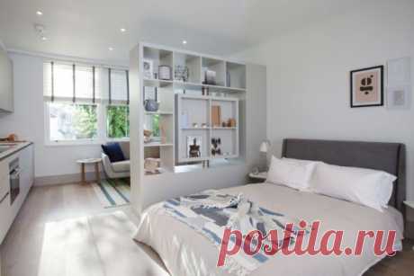 Однокомнатная квартира с кроватью и диваном: дизайн на фото