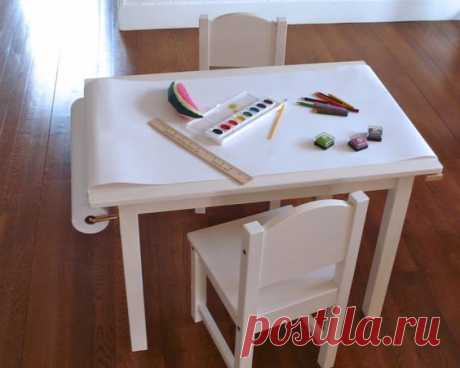 DIY Kiddo Art Table by seaurchinstudio: Made with an Ikea Gulliver table, Beka paper roll and gooseneck brackets! #DIY #Kids #Art_Table