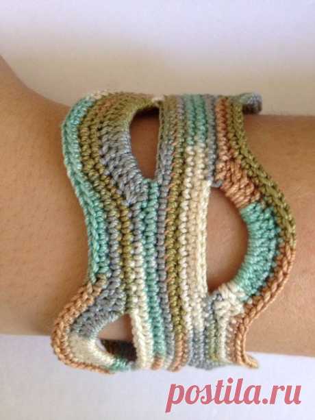 (1) Freeform Crochet Cuff Bracelet, Unique One of a Kind, Antique Button Closure, Fall Color Fashion, Great Gift For Her Under 25. $24.00, via Etsy.