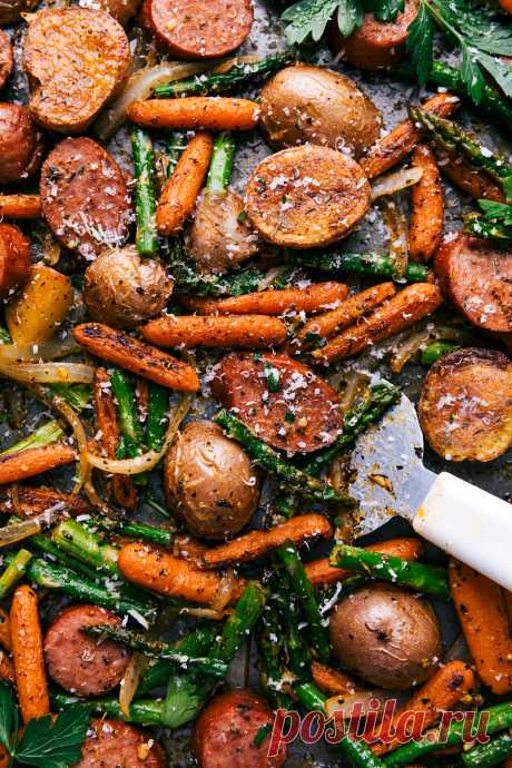 One Pan Roasted Garlic Potatoes, Asparagus, Carrots, and Sausage tossed with olive oil and an amazing seasoning mix. Family-friendly, easy weeknight meal!