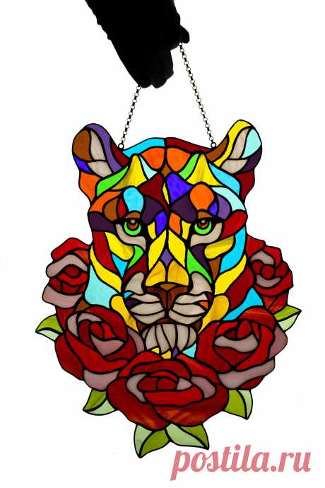 Stained glass suncatcher Lioness in roses window hanging Stain glass g Window hanging suncatcher made of stained glass pieces by my own disign.Handmade using Tiffany copper foil technique.Looks amazing in the sunlight.You will get it completely ready for installation. It comes with a self-adhesive hook and chain.It will be a great gift for friends or relatives. Width: 11 inches Height: 14