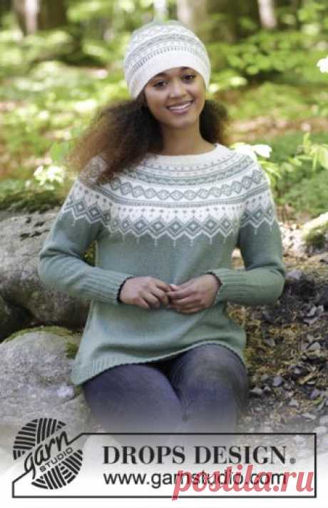 Perles du Nord / DROPS 180-2 - Free knitting patterns by DROPS Design The set consists of: Knitted jumper with round yoke, multi-coloured Norwegian pattern and A-shape, worked top down. Sizes S - XXXL. Hat with multi-coloured Norwegian pattern.
The set is worked in DROPS Flora.