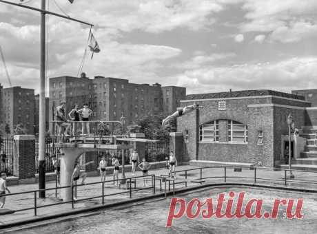 Nine-Centers: 1942 June 1942. "Brooklyn, New York. Red Hook housing development. Diving pool at the play center which is supervised by the city's Department of Parks. There are separate pools for swimming and diving. Charge is nine cents for children, twenty-five cents for adults." Acetate negative by Arthur Rothstein for the Office of War Information.