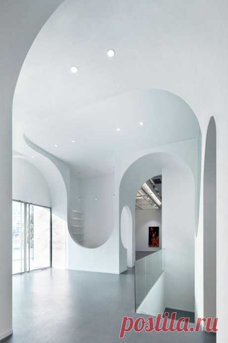 Beijing art gallery by Penda featuring topsy-turvy archways