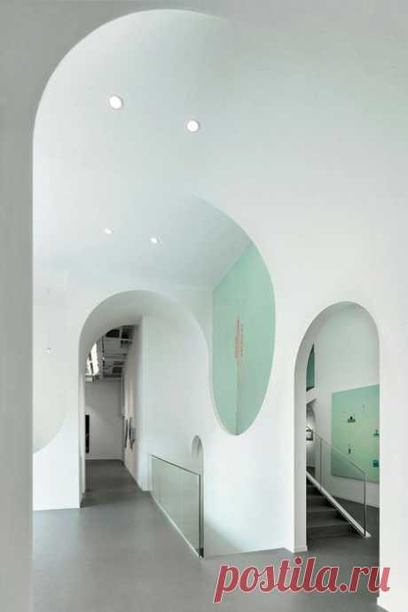 Beijing art gallery by Penda featuring topsy-turvy archways