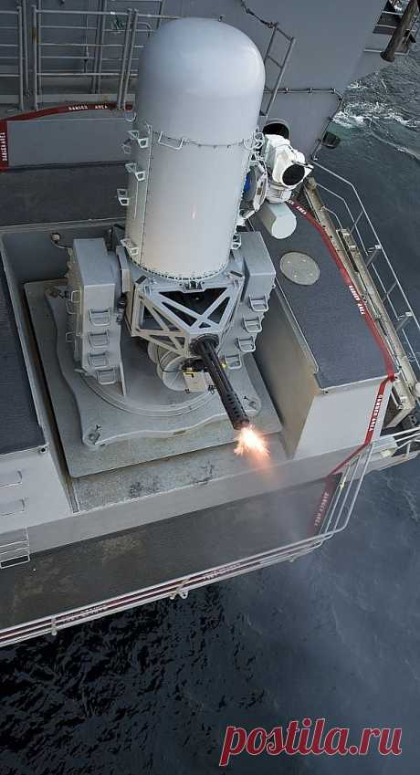 A Phalanx close-in weapons system fires during ... | Weapons &amp; 2nd Am…