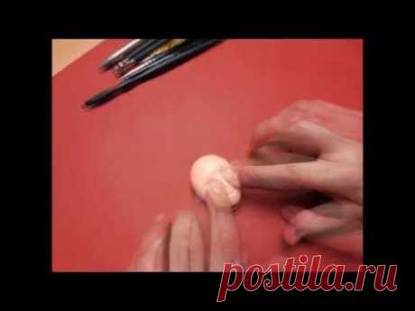 Scolpire un viso con la pasta di zucchero - Sculpting a face with fondant